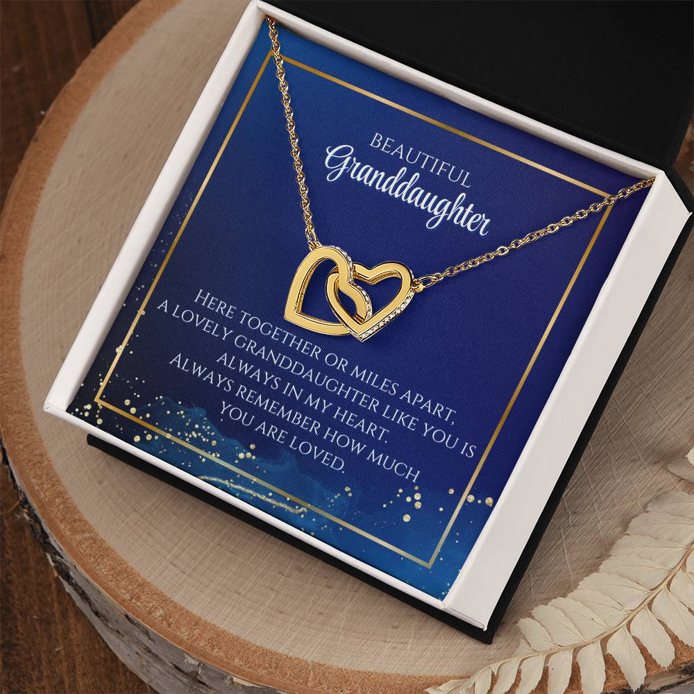 To My Beautiful Granddaughter Necklace. Here together or miles apart. A lovely granddaughter like you is always in my heart. Always remember how much you are loved. Interlocking Hearts Necklace