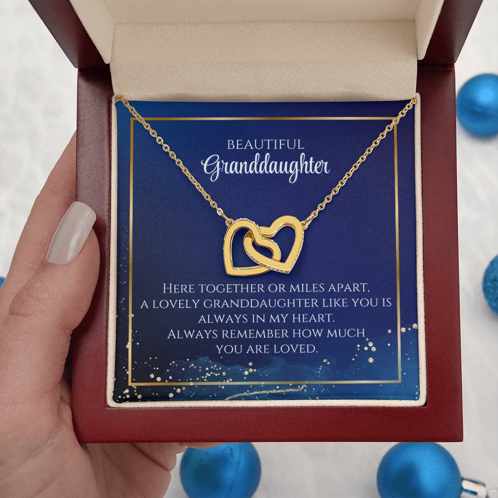 To My Beautiful Granddaughter Necklace. Here together or miles apart. A lovely granddaughter like you is always in my heart. Always remember how much you are loved. Interlocking Hearts Necklace