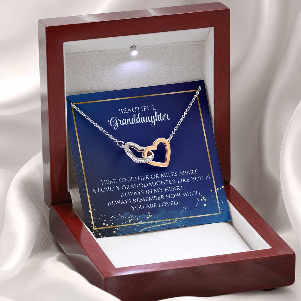 To My Beautiful Granddaughter Necklace. Here together or miles apart. A lovely granddaughter like you is always in my heart. Always remember how much you are loved. Interlocking Hearts Necklace